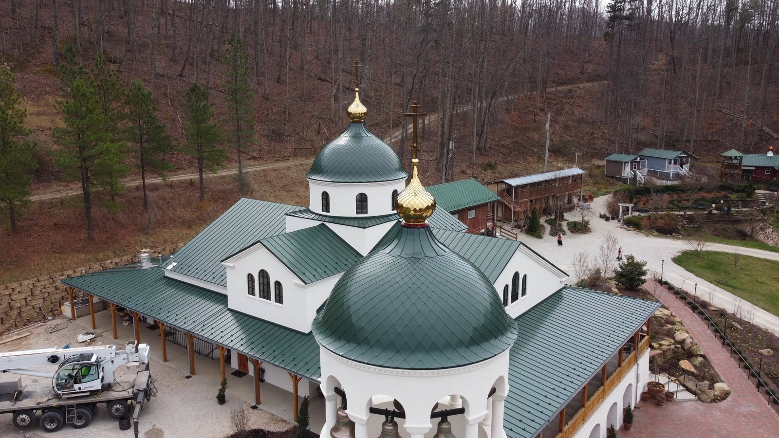Crosses and Cupolas Installed on Domes of New Church - Holy Cross Monastery